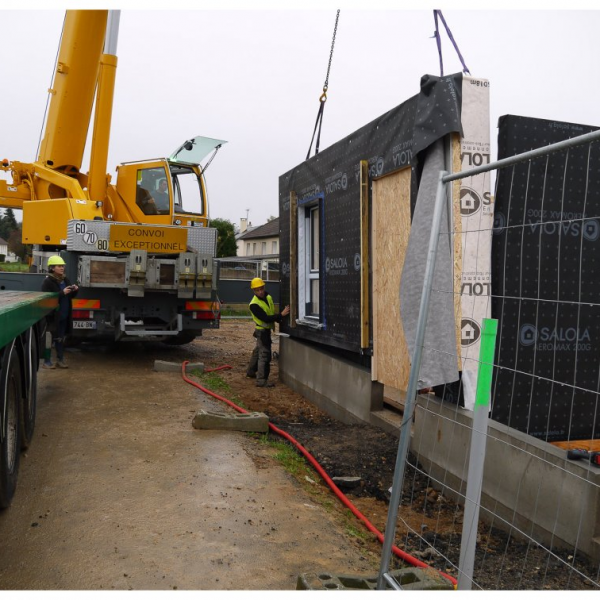 pose du mur sur le relevé béton